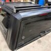 2023 GMC Sierra double-cab 6’6 bed black aluminum topper